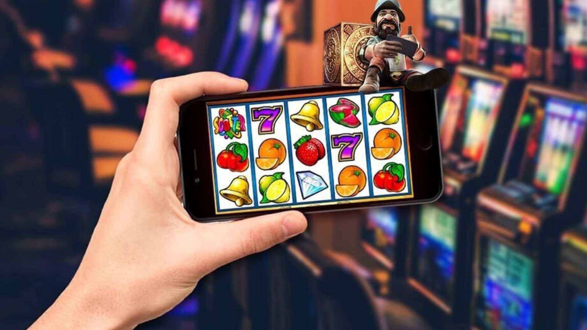 a hand holding a phone playing slot games with real money 